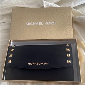 Michael Kors black/gold Lg Trifold leather wallet.